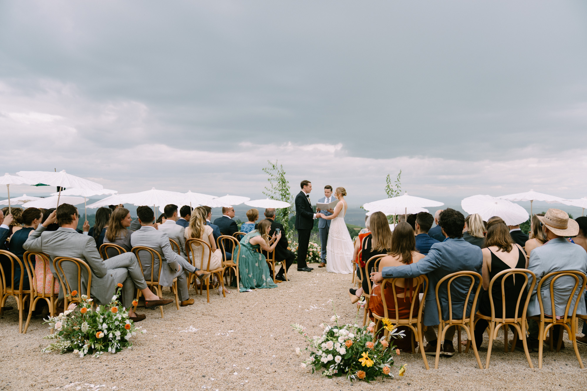 A Black Walnut Inn wedding in the heart of Oregon's wine country — rolling vineyards, overcast summer skies, and two people completely at ease with each other.