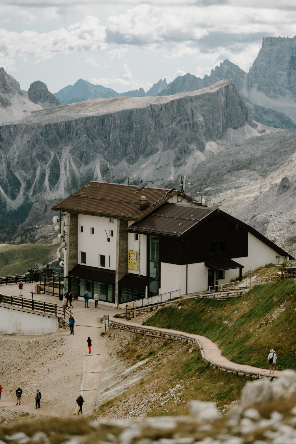 A photo of Rifugio Lagazuoi nestled in the mountains. 