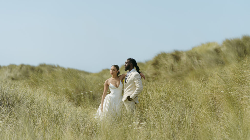 Elopement photos in romantic, rolling grassy hills at the Oregon Coast. 