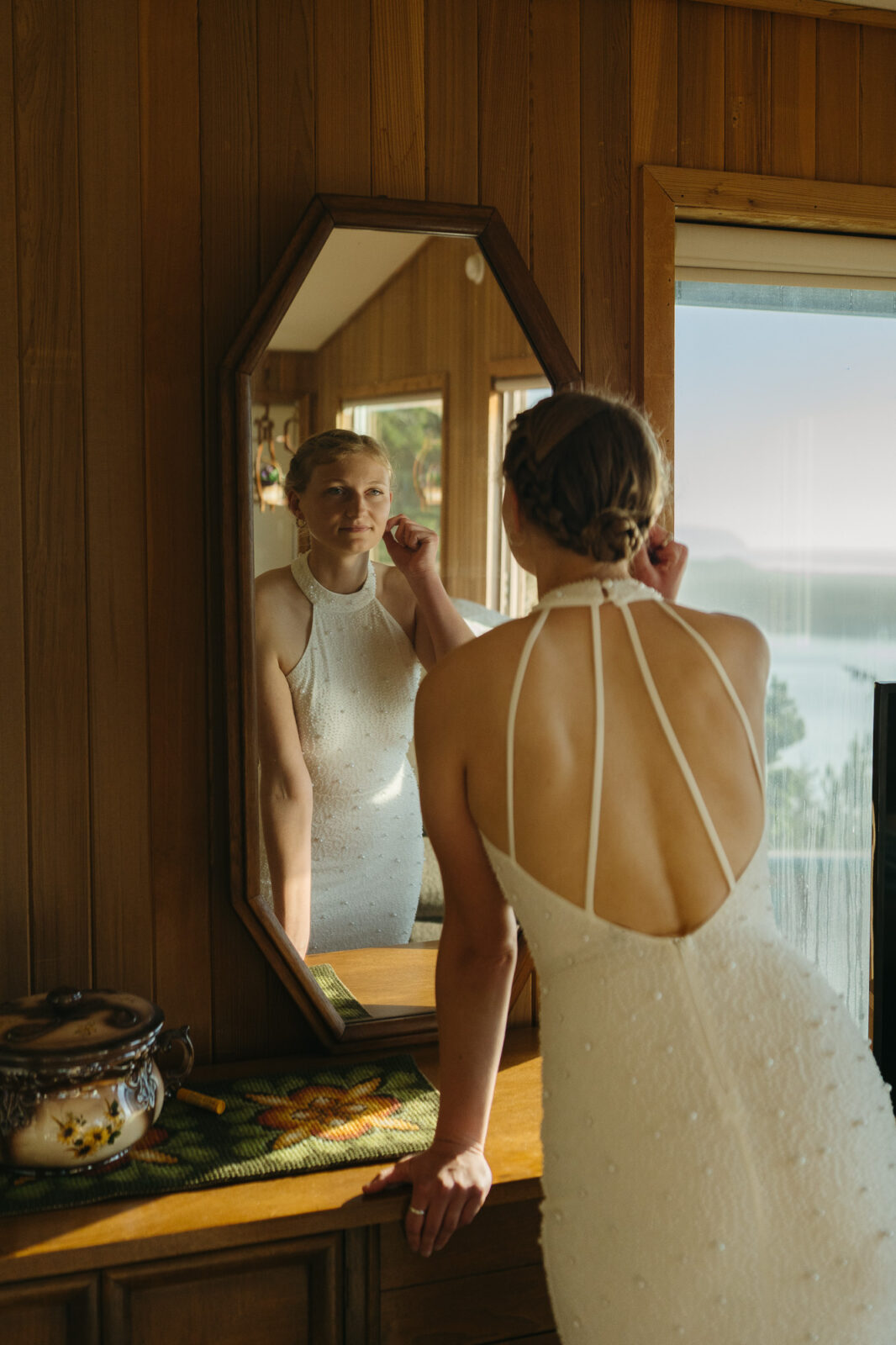 A bride gets ready for her Oregon Coast elopement in a VRBO