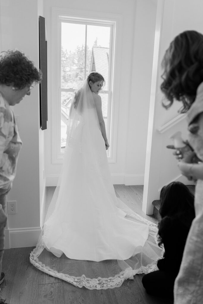 Final touches before walking down the aisle at Roche Harbor Resort's garden ceremony.
