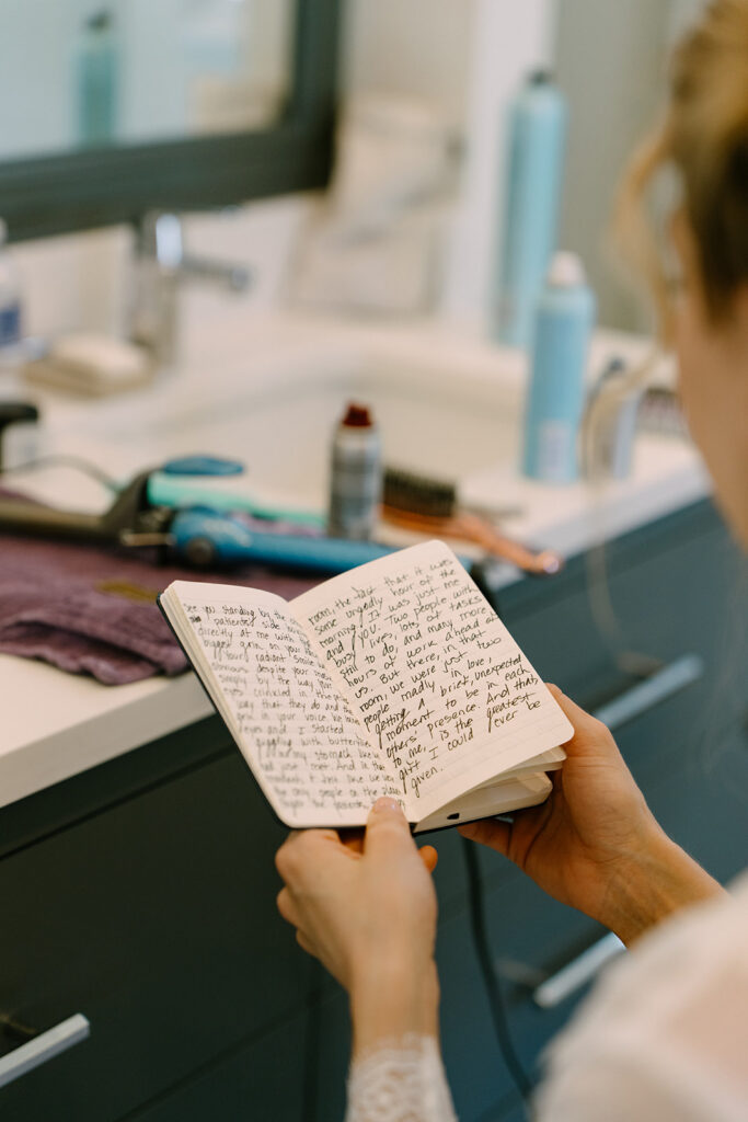 Reading handwritten vows before the ceremony at Roche Harbor Resort, San Juan Island, Washington.